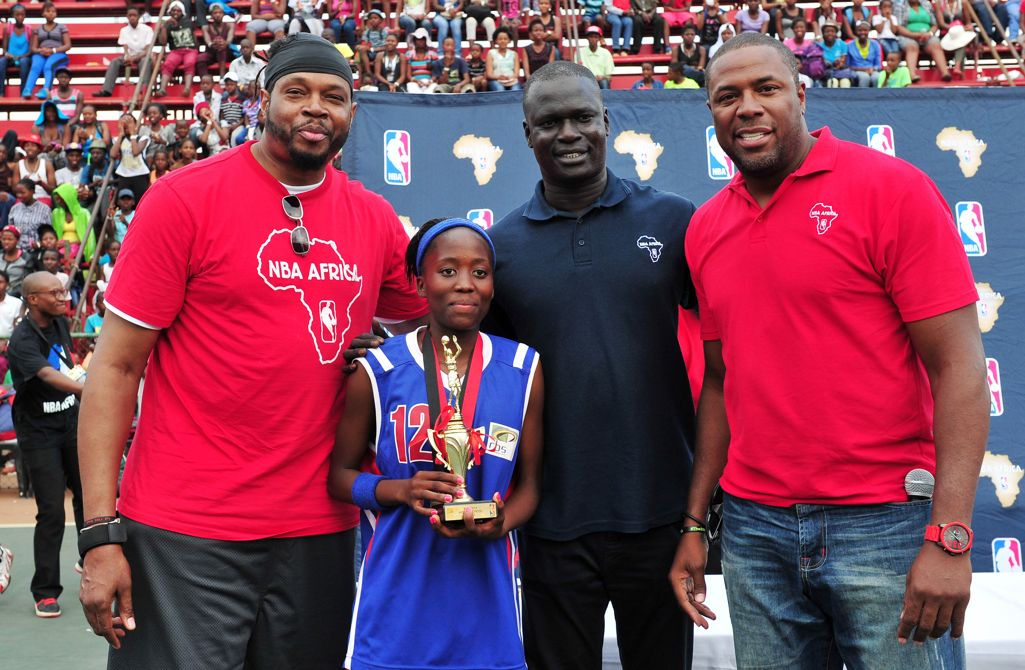 Most Valuable Player of the girls Middle School: Obakeng Noge with NBA Legends: Sam Perkins , Cedric Ceballos and NBA Vice President Amadou Fall, 25 October 2014